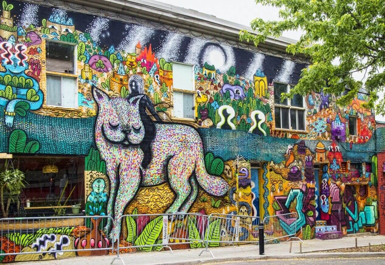 Colorful street art mural with vibrant details.